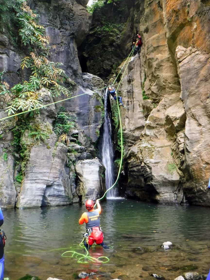 The final zipline on a canyoning tour in front of Salto do Cabrito.