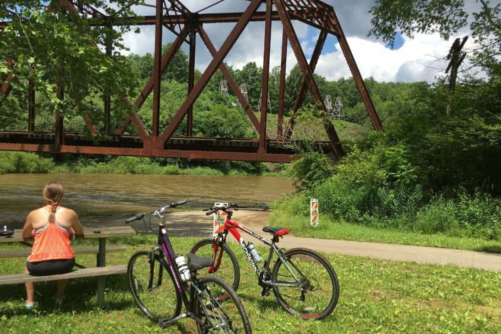 The bike trail in Oil Creek State Park travels along with water and through historic areas. Oil Creek State Park is a great state park to visit near Pittsburgh.
