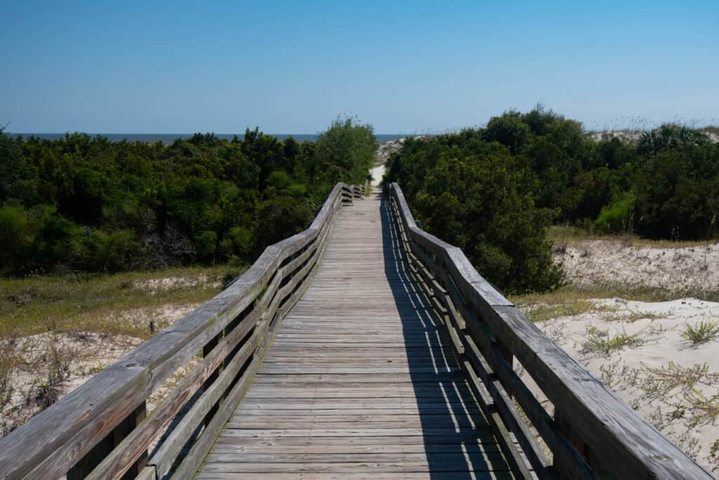 A long wooden boardwalk leads to the Sea Camp beach on Cumberland Island.