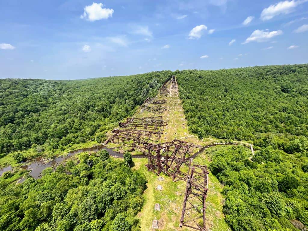 Towers from the damaged Kinzua Viaduct can be seen on the valley floor from the end of the Kinzua Skywalk.